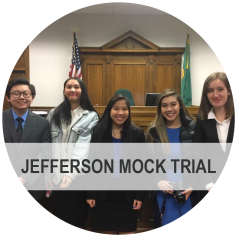 Jefferson Mock Trial - Photo: Teens participating in a Mock Trial pose for a picture in a court room